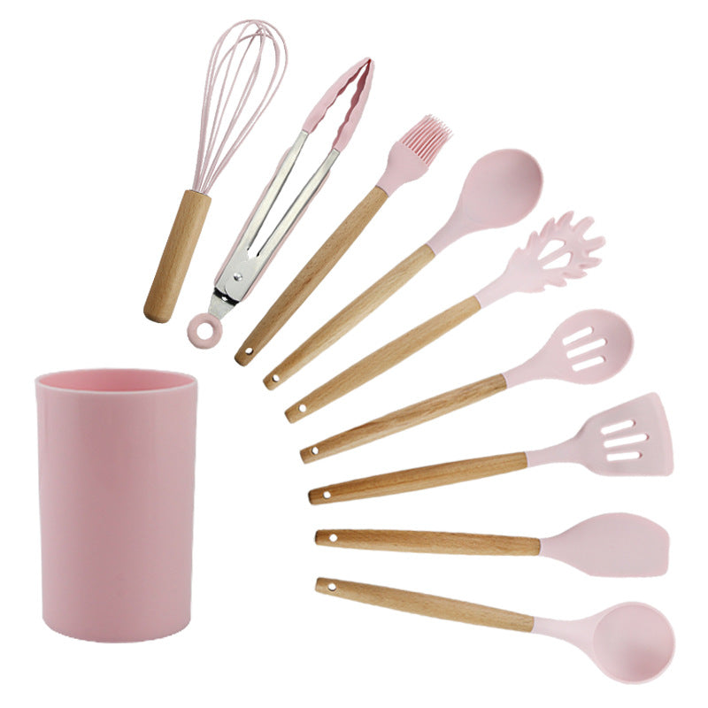 Pink wooden-handled silicone kitchen utensils