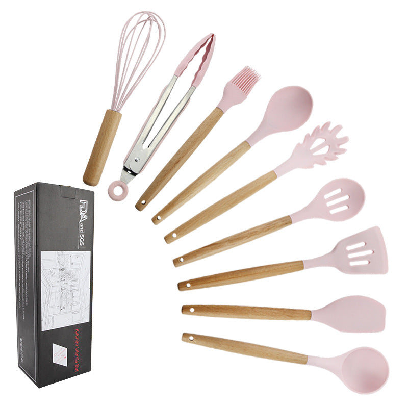 Pink wooden-handled silicone kitchen utensils