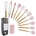 Pink wooden-handled silicone kitchen utensils