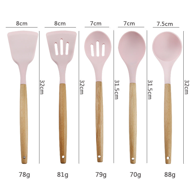 Pink wooden-handled silicone kitchen utensils