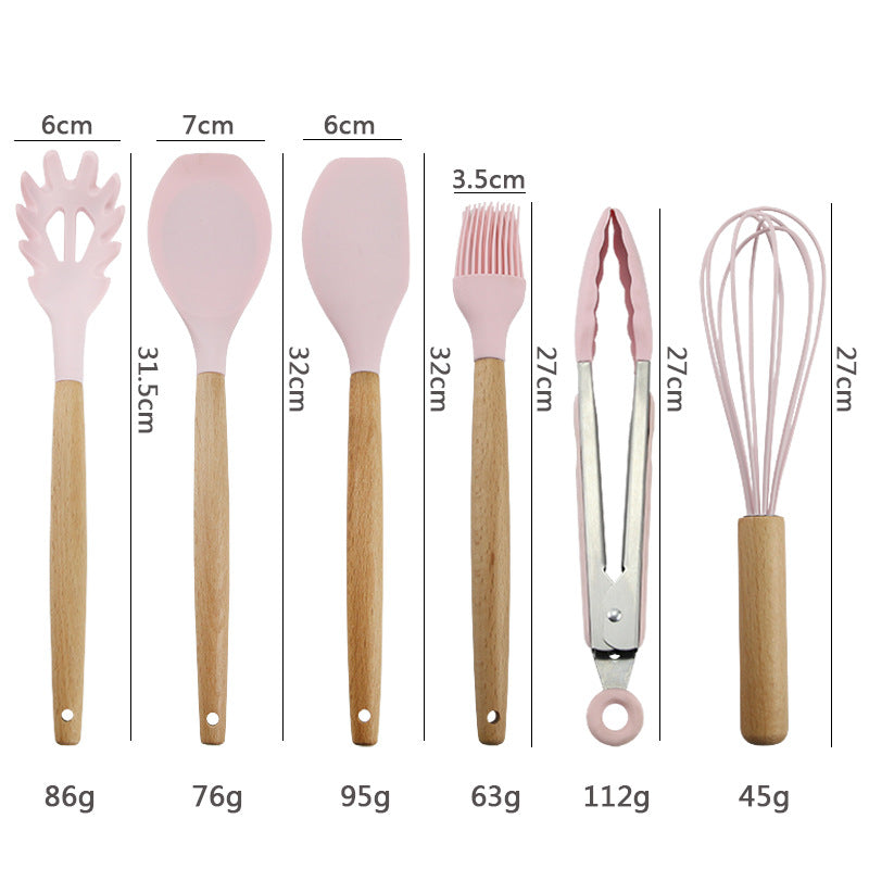 Pink wooden-handled silicone kitchen utensils