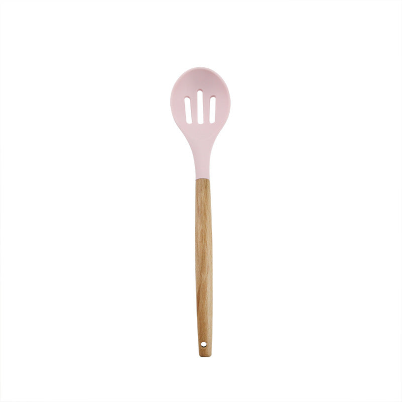 Pink wooden-handled silicone kitchen utensils