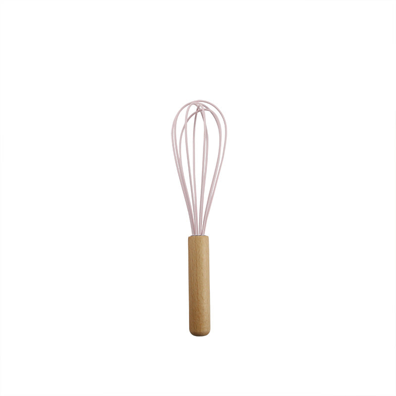 Pink wooden-handled silicone kitchen utensils
